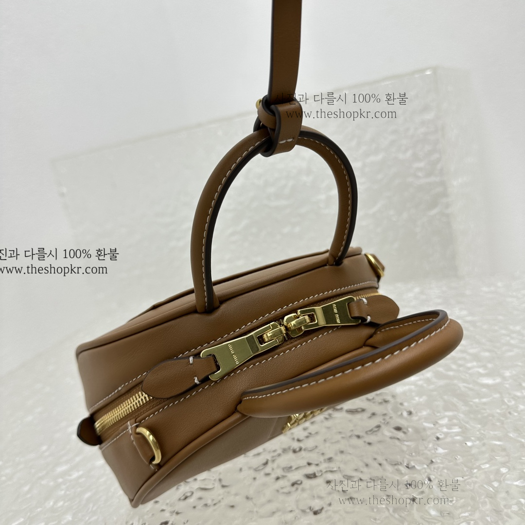 (카타) 미우미우 가죽 탑 핸들 미니 백